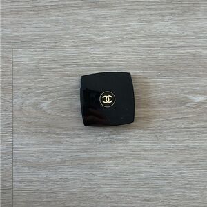 CHANEL Glossy Black Compact with Gold Emblem